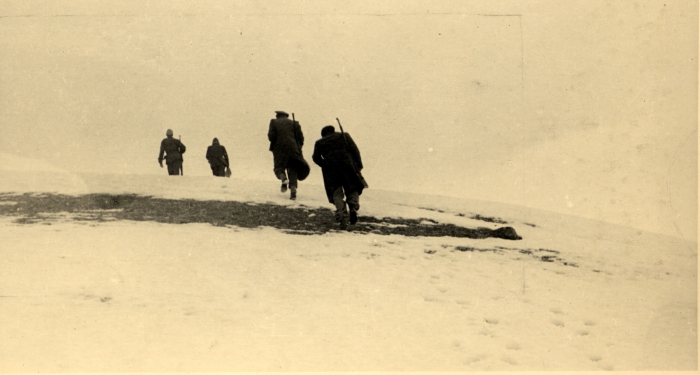 Partisans marching in the area of Ligonchio (RE).Winter 1945, Istoreco Archives, Reggio Emilia.